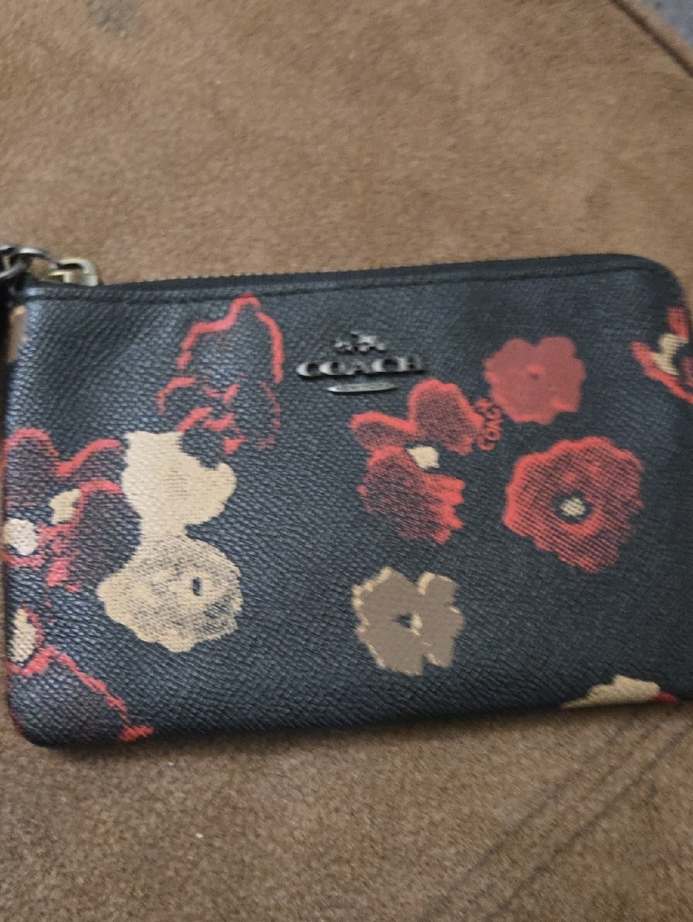 COACH Black Floral Zip Wristlet with Red and Tan Blooms NWOT.
